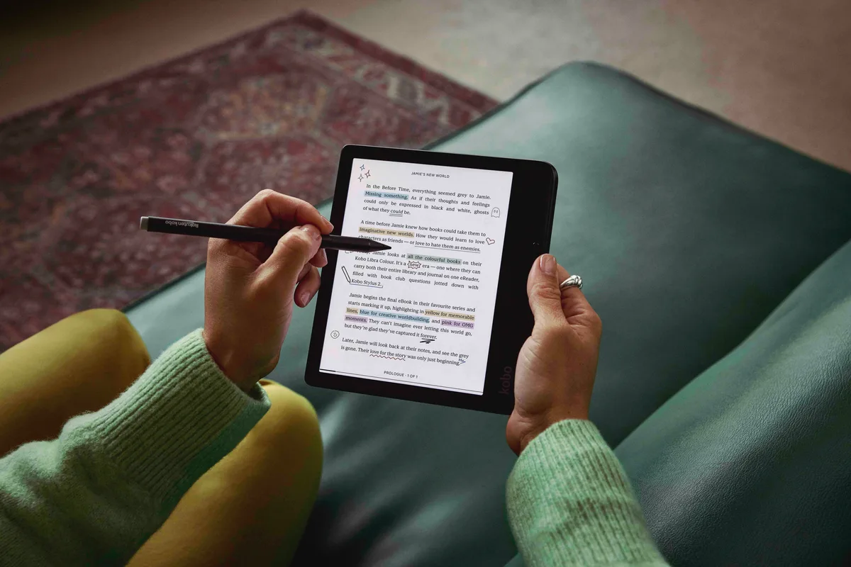 A Kobo Libra Colour and Kobo Stylus 2 used to mark a book page